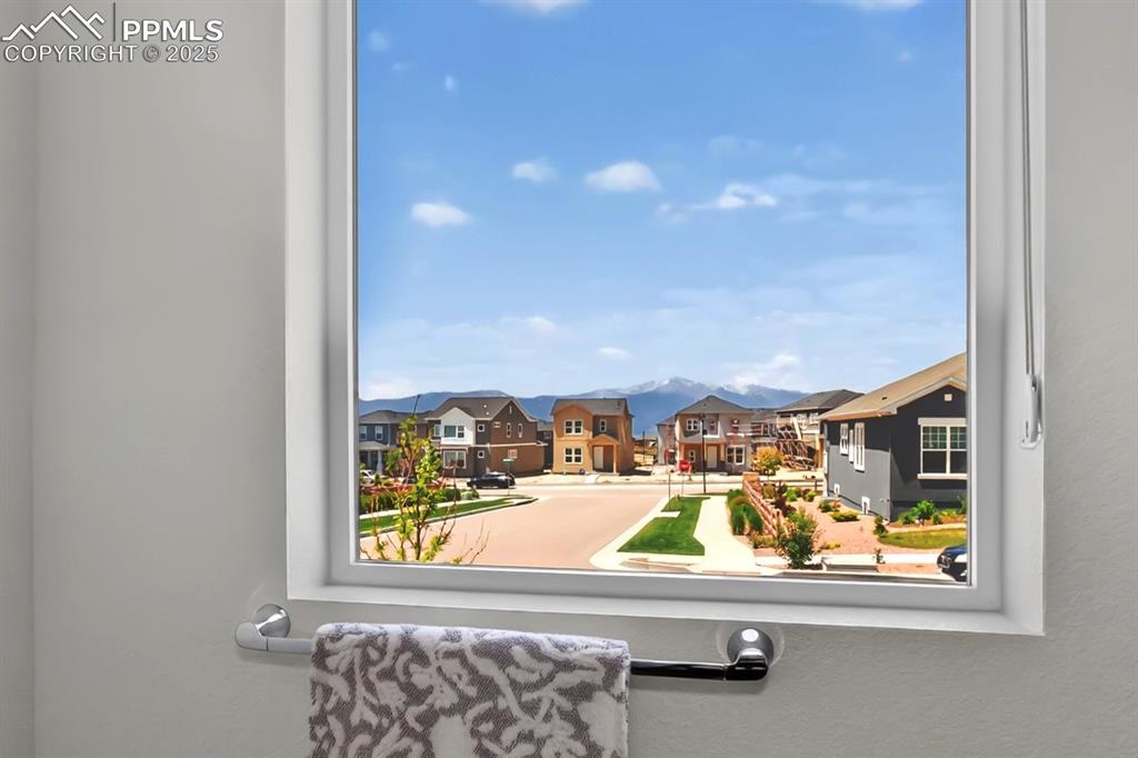 Image 25 of 48: View of Pikes Peak from Primary Bathroom window