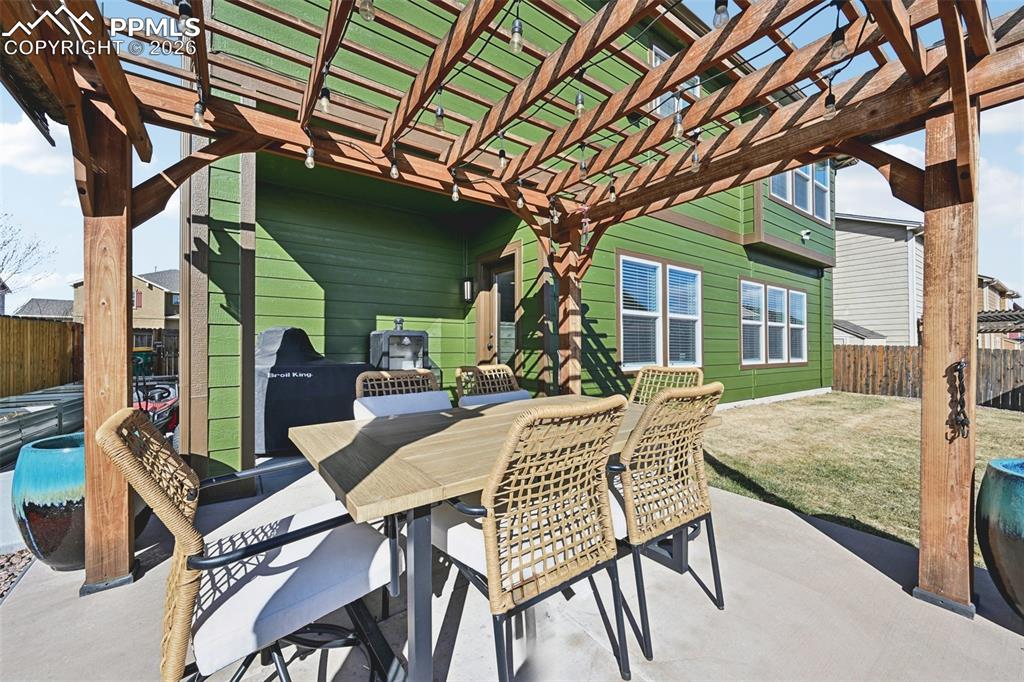 Image 45 of 48: Patio with pergola