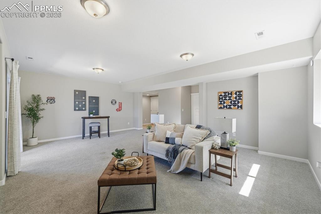 Image 27 of 44: Basement Rec Room