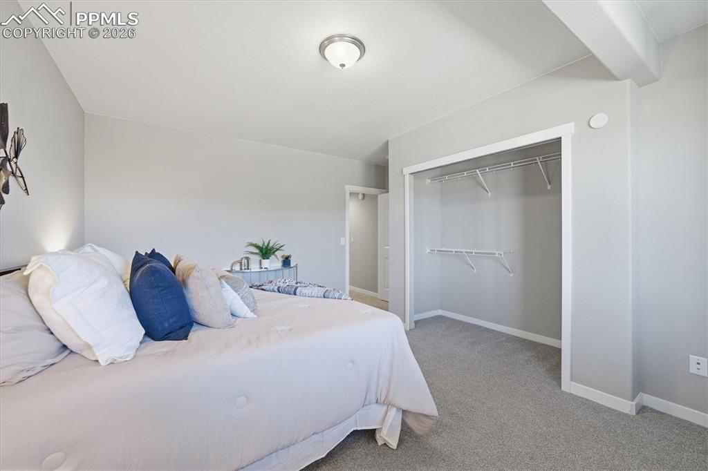 Image 32 of 44: Basement Bedroom