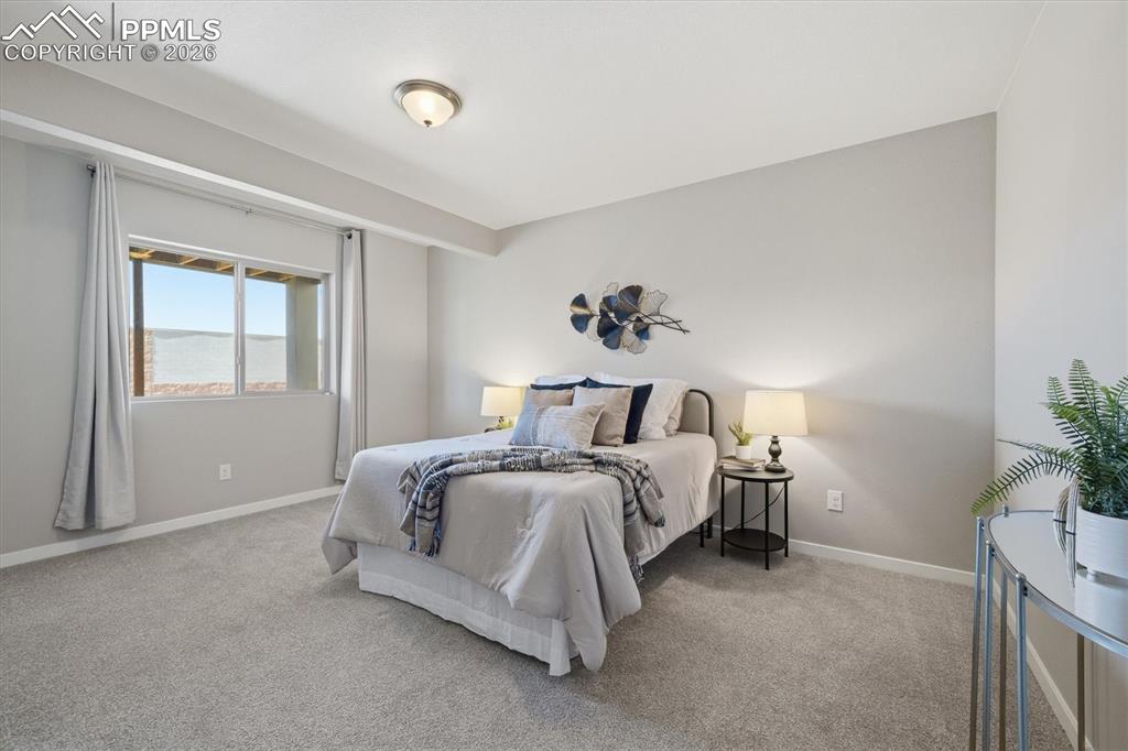 Image 34 of 44: Basement Bedroom