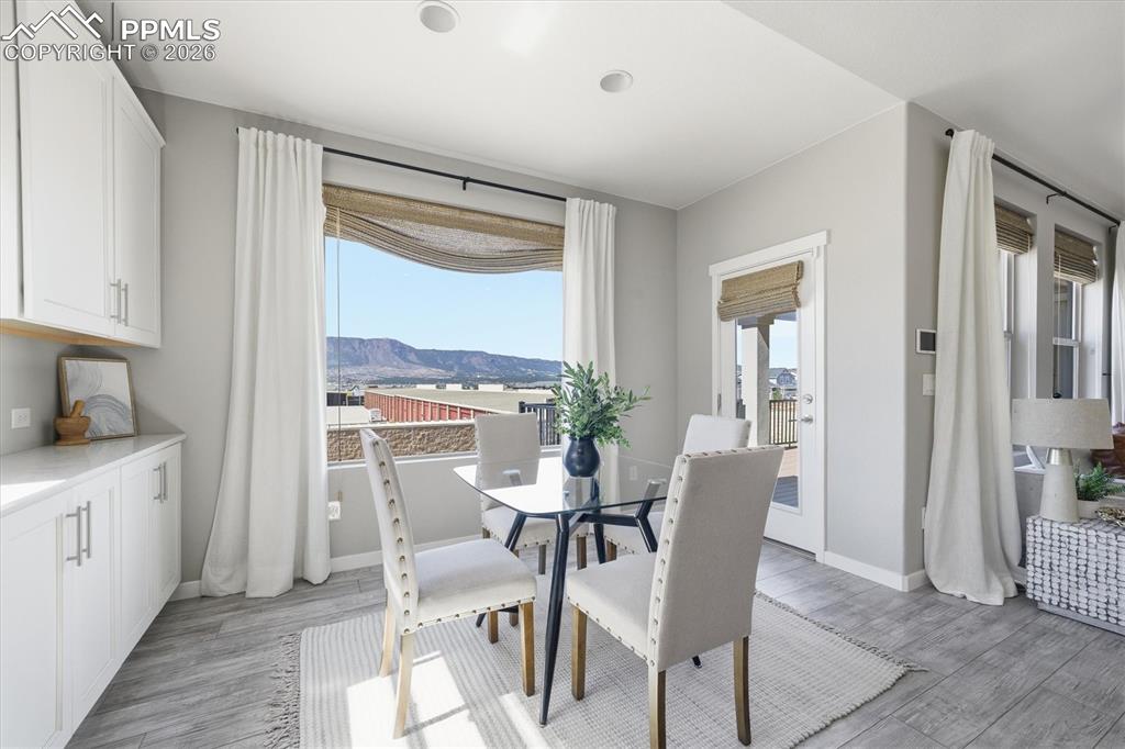 Image 7 of 44: Dining Nook with extended cabinets