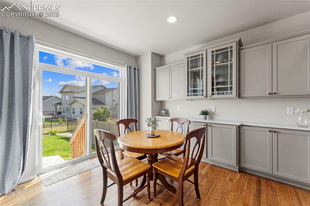 Image 15 of 46: Where clinking glasses and belly laughs are regulars at the table.