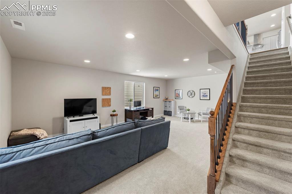 Image 25 of 46: Ceilings tall enough to stretch dreams—and maybe even your Christmas tree.