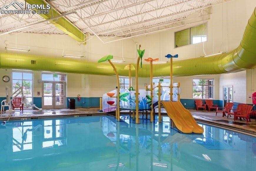 Image 39 of 46: Indoor community pool and splash pad!
