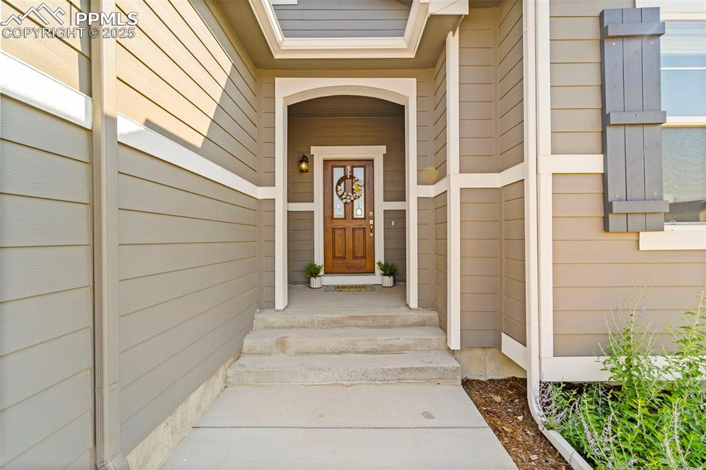 Image 4 of 46: Front Steps to Covered Entry