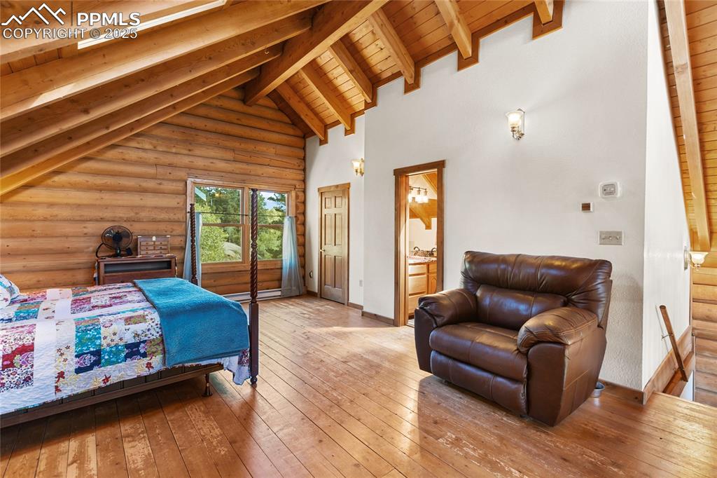 Image 19 of 34: It has soaring ceilings and the wood accents you love