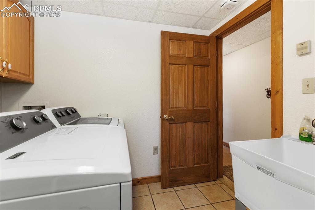 Image 26 of 34: You also have a laundry/mud room on the lower level