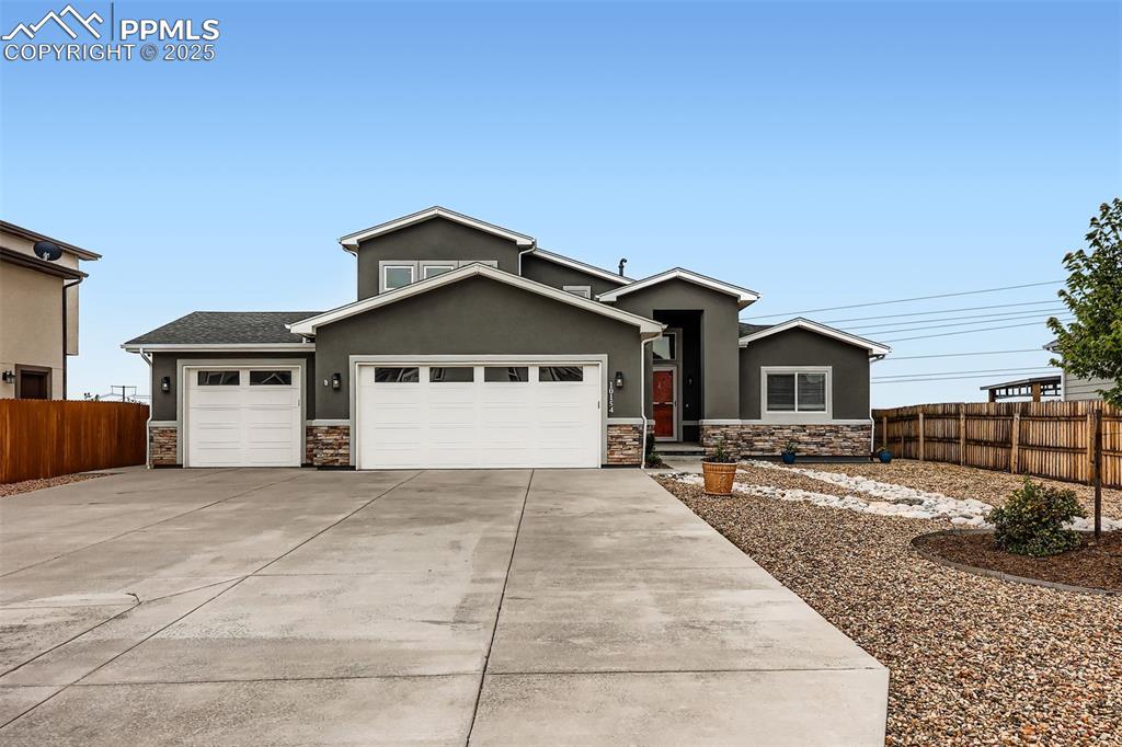 Caption: From the inviting front porch to the beautifully landscaped backyard, every corner of this residence