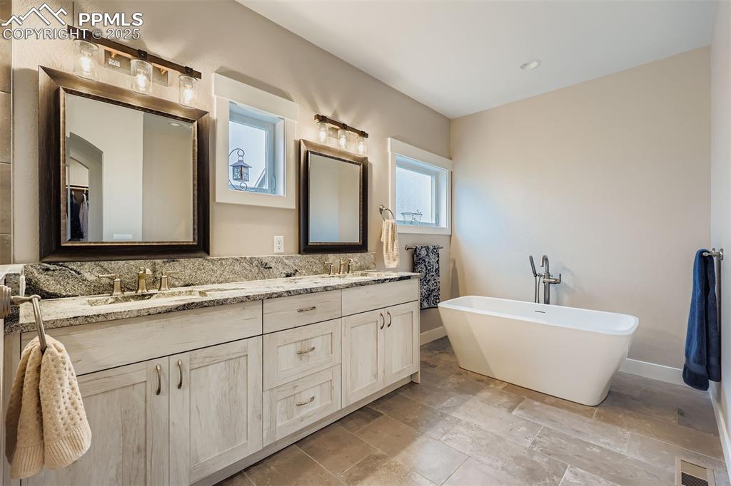 Image 14 of 42: Princess large soaking tub, perfect after a long day of work or play. 