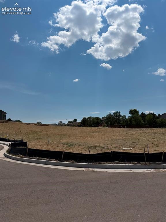 Caption: View of lot from the street.