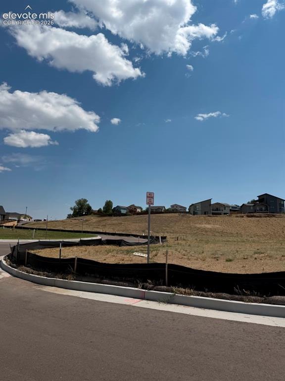 Image 2 of 9: View of lot from the street.