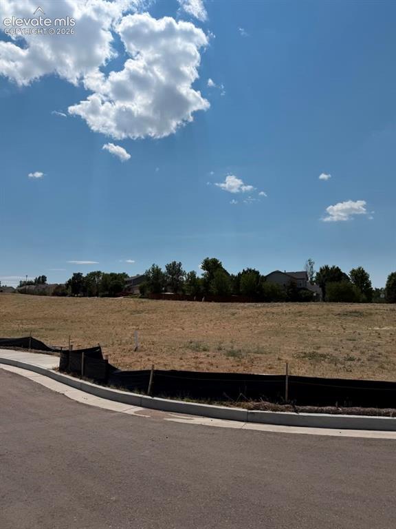 Image 3 of 9: View of lot from the street.