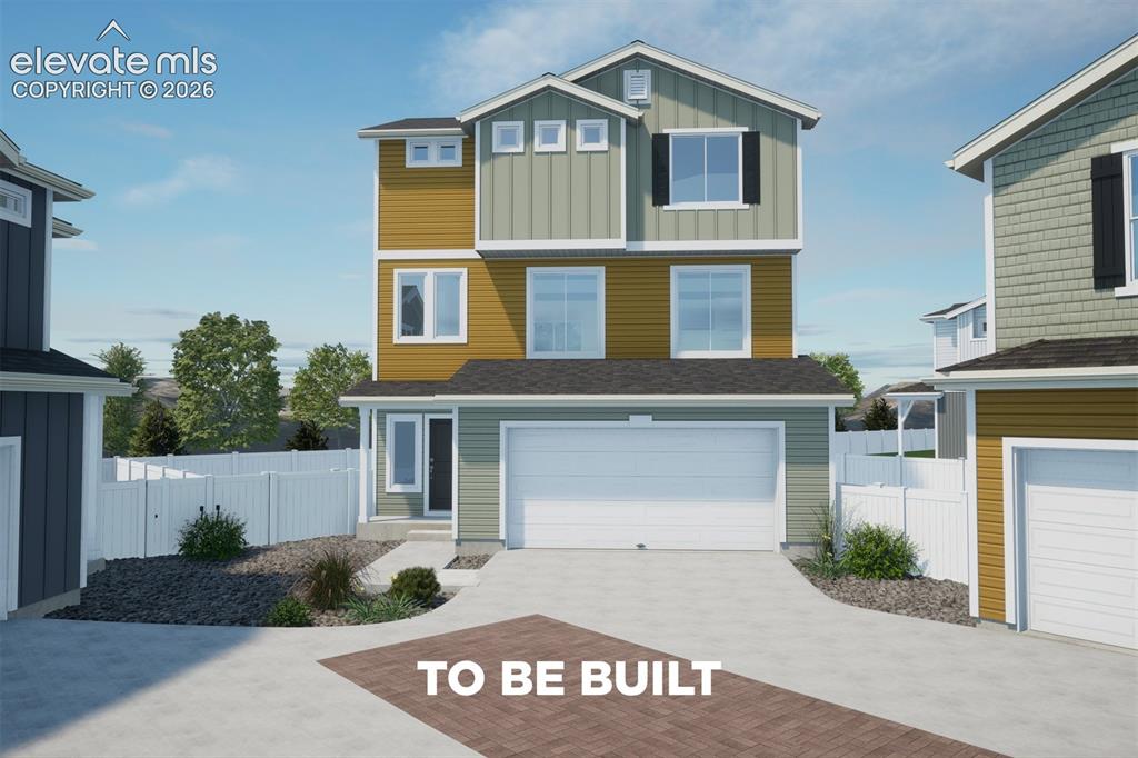 Caption: Three-story exterior with horizontal siding, covered entry, attached garage, and a concrete driveway