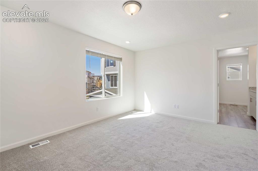Image 16 of 25: *photos of a model home*