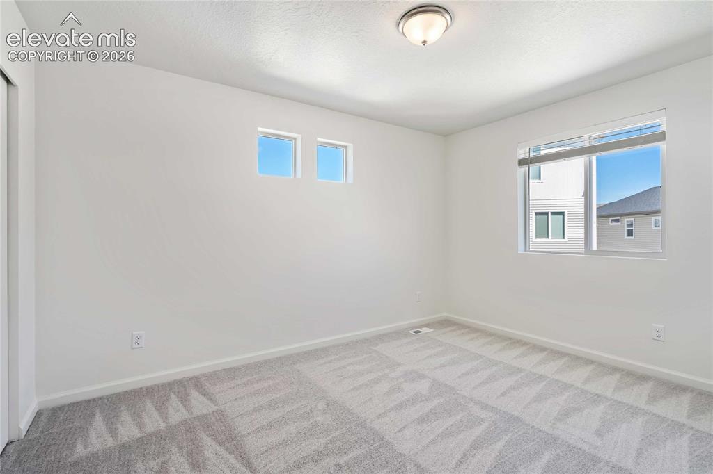 Image 19 of 25: *photos of a model home*