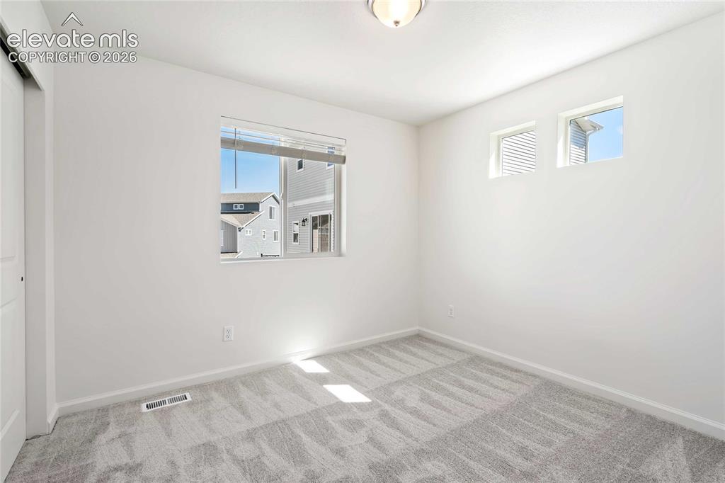 Image 21 of 25: *photos of a model home*