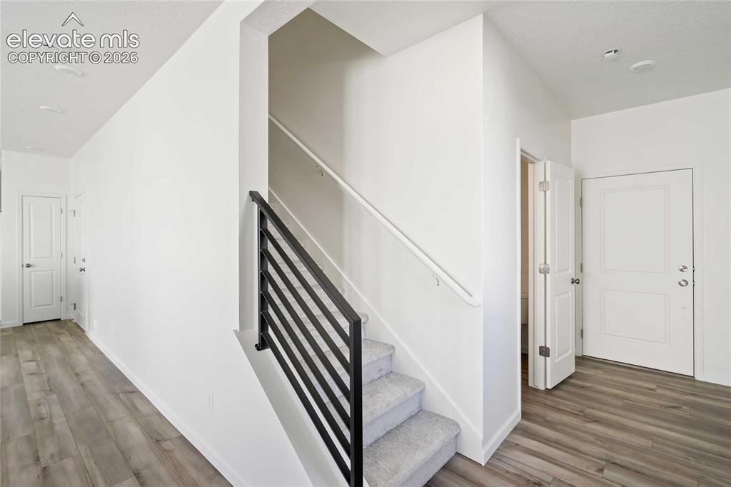Image 3 of 25: Wood-finish flooring throughout the main level
*photos of a model home*