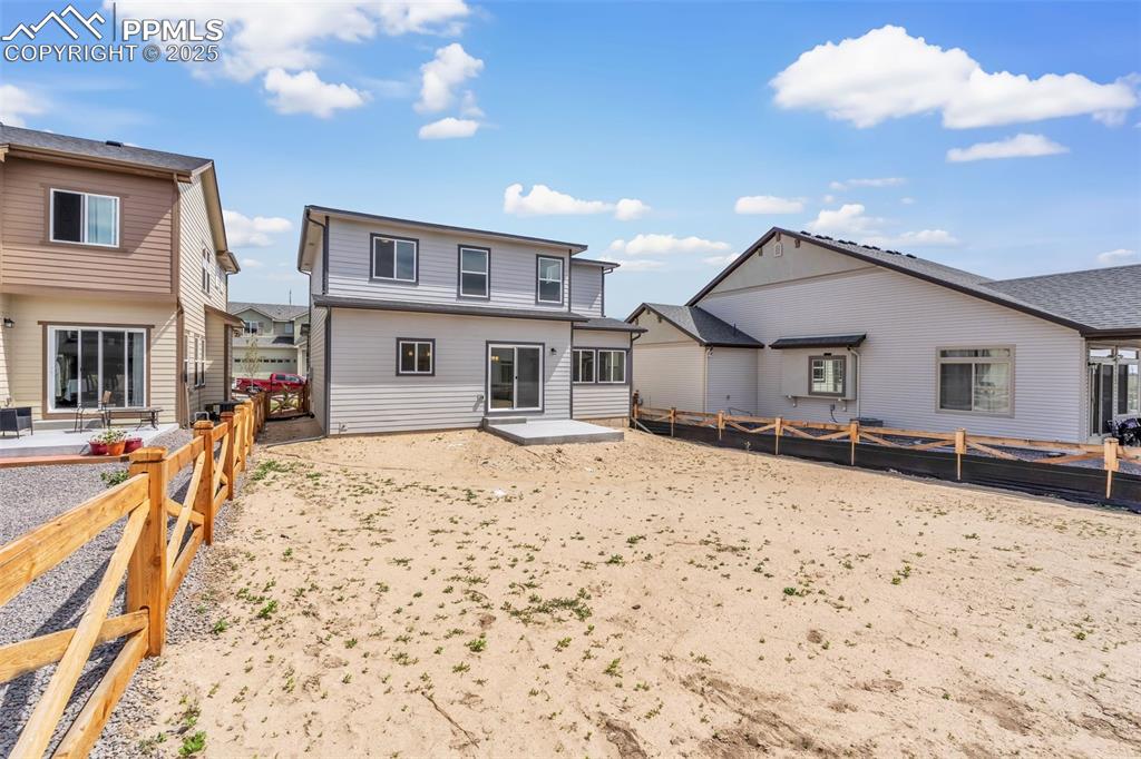 Image 43 of 43: Rear view of property with a patio and a fenced backyard