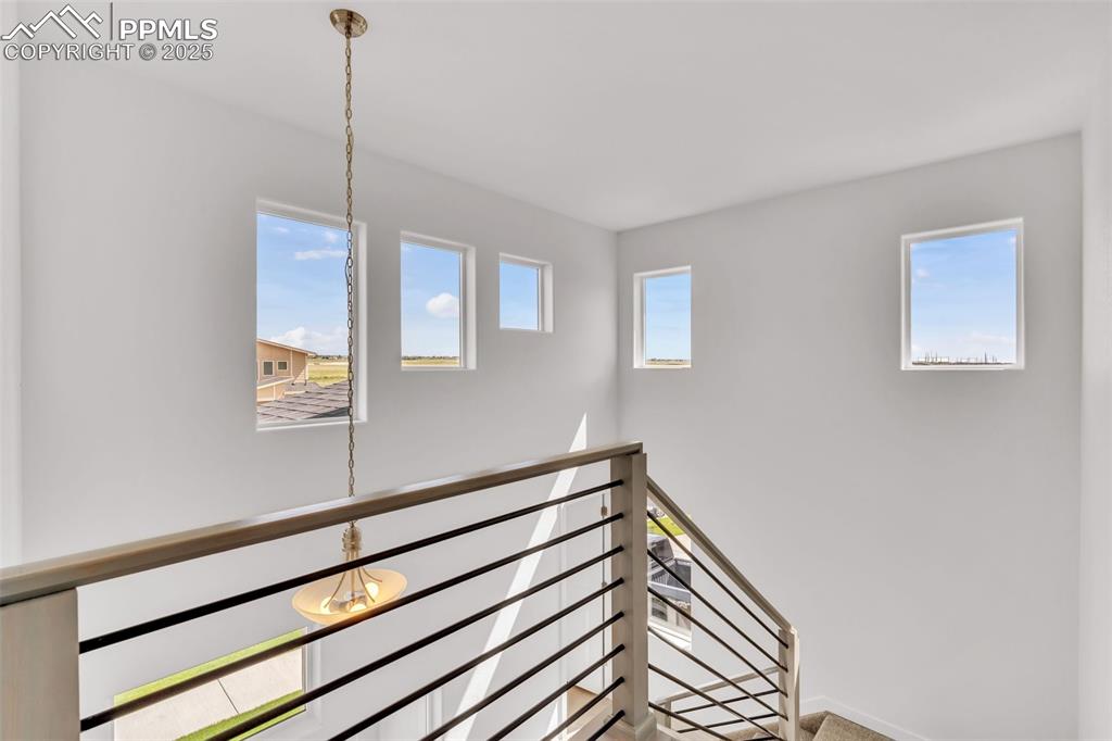 Image 7 of 43: Hallway with plenty of natural light