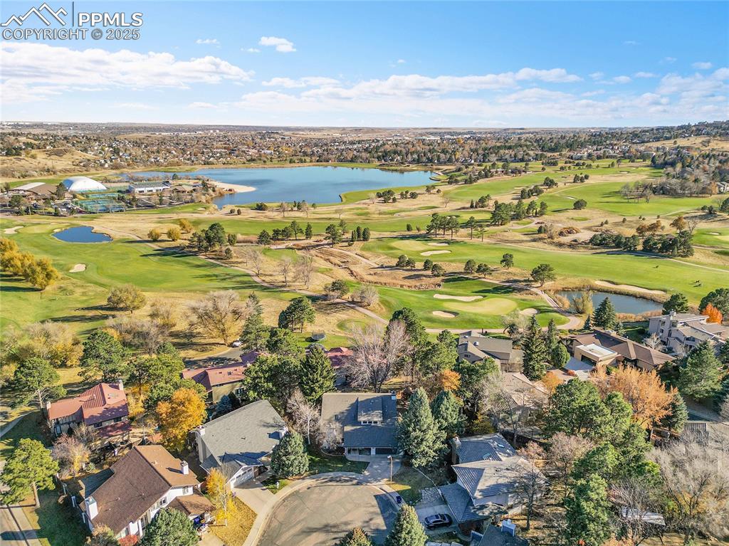 Image 40 of 43: Aerial view of property and surrounding area with a large body of water and