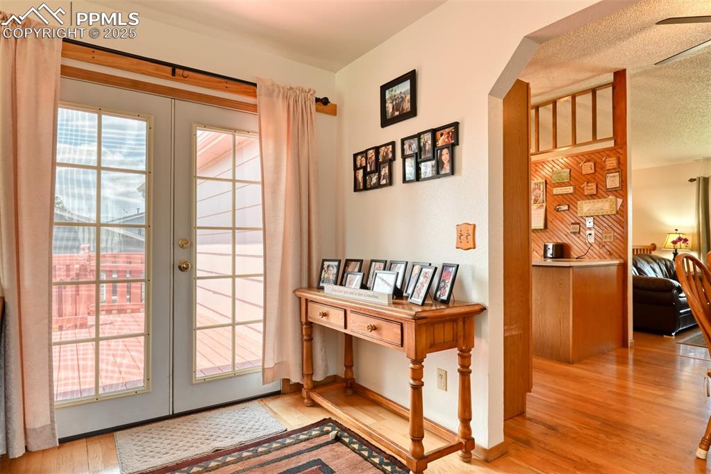 Image 16 of 46: French doors to back deck