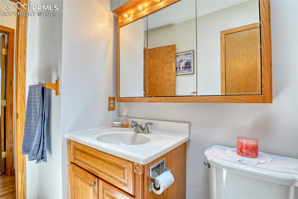 Image 34 of 46: Bathroom featuring vanity and toilet