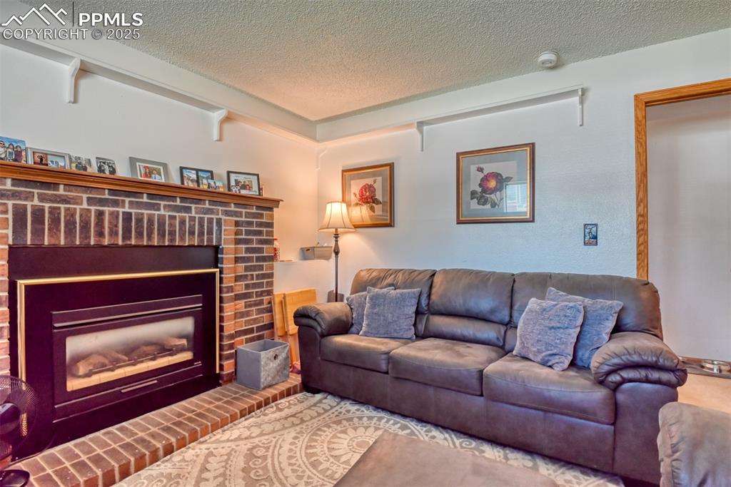 Image 43 of 46: Wood burning fireplace