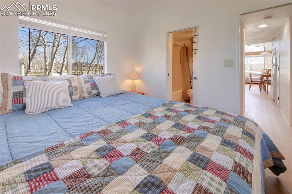 Image 12 of 50: Bathroom Adjoins Master