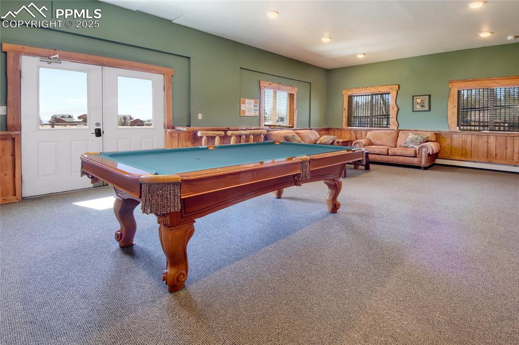 Image 25 of 50: CH Game Room Featuring Pool
