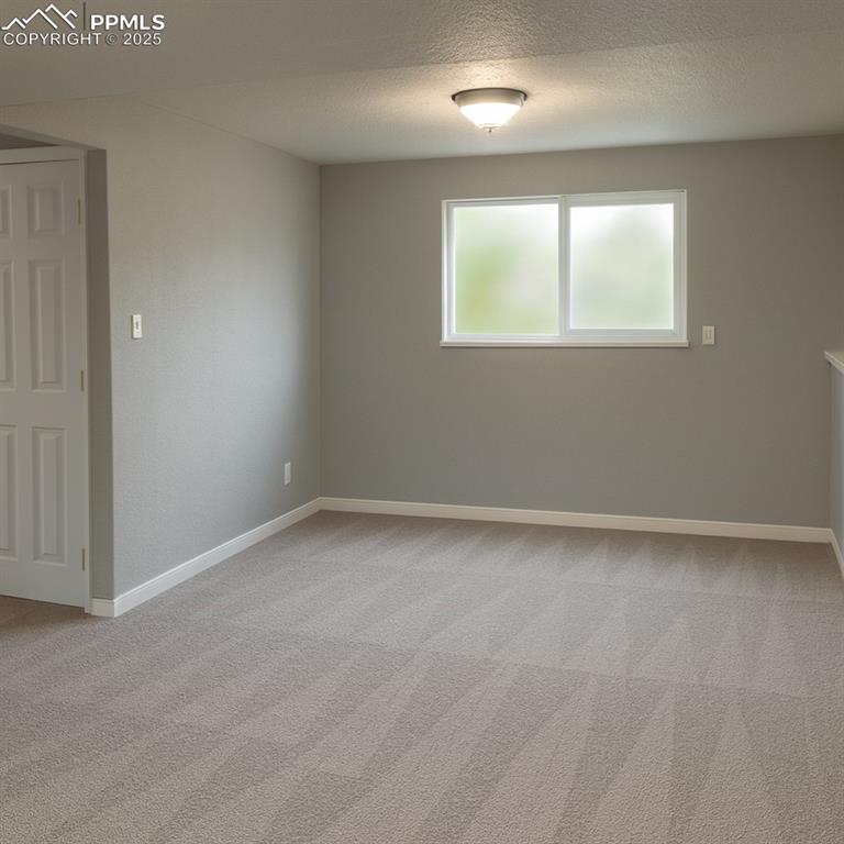 Image 10 of 10: Lower-level family room