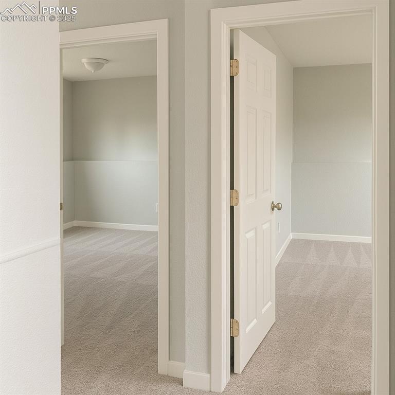 Image 11 of 14: Lower hall to bedrooms