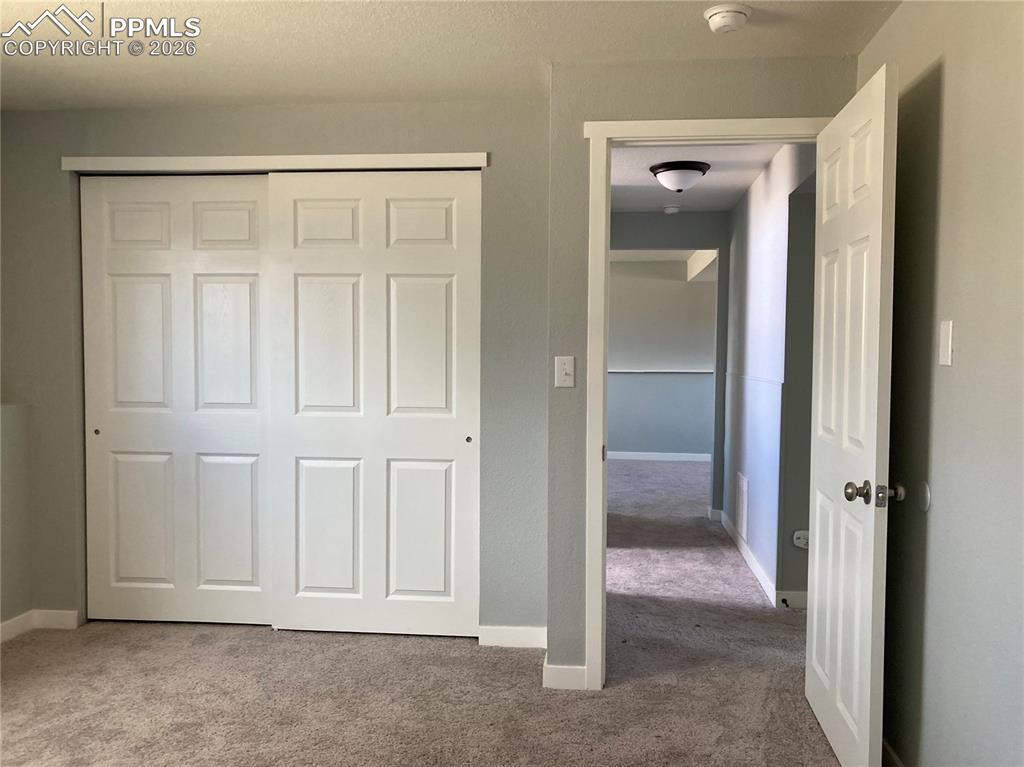 Image 14 of 14: Lower level bedroom