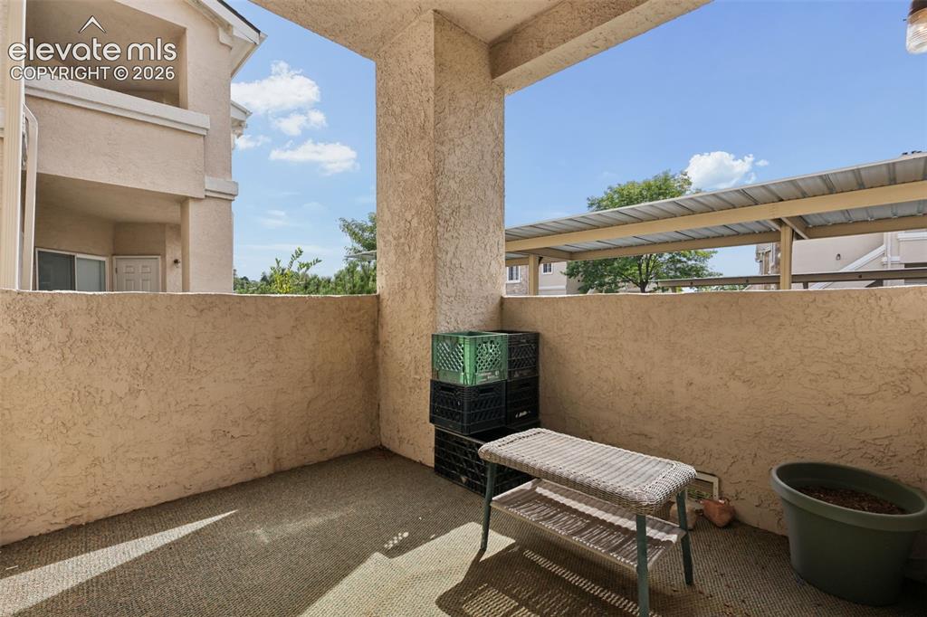 Image 25 of 27: Textured stucco exterior walls