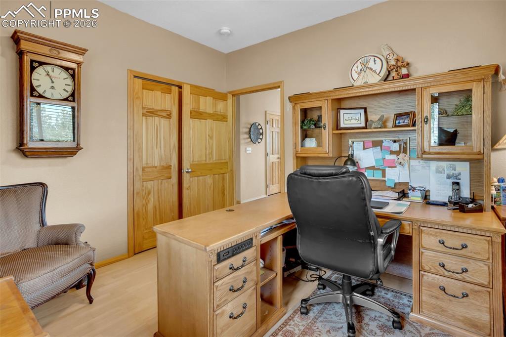 Image 21 of 44: Main level bedroom #2, used as an office
