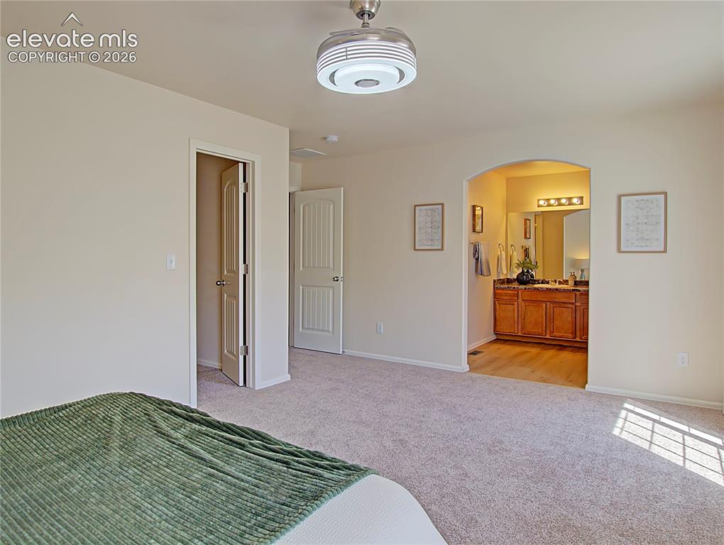 Image 18 of 28: Master Bedroom