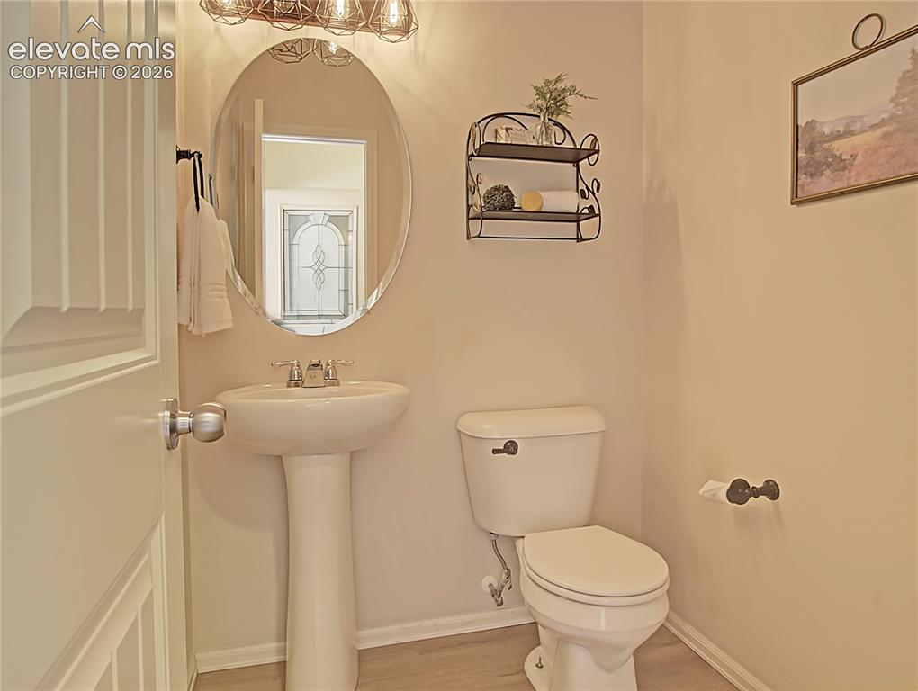 Image 4 of 28: main level guest bath