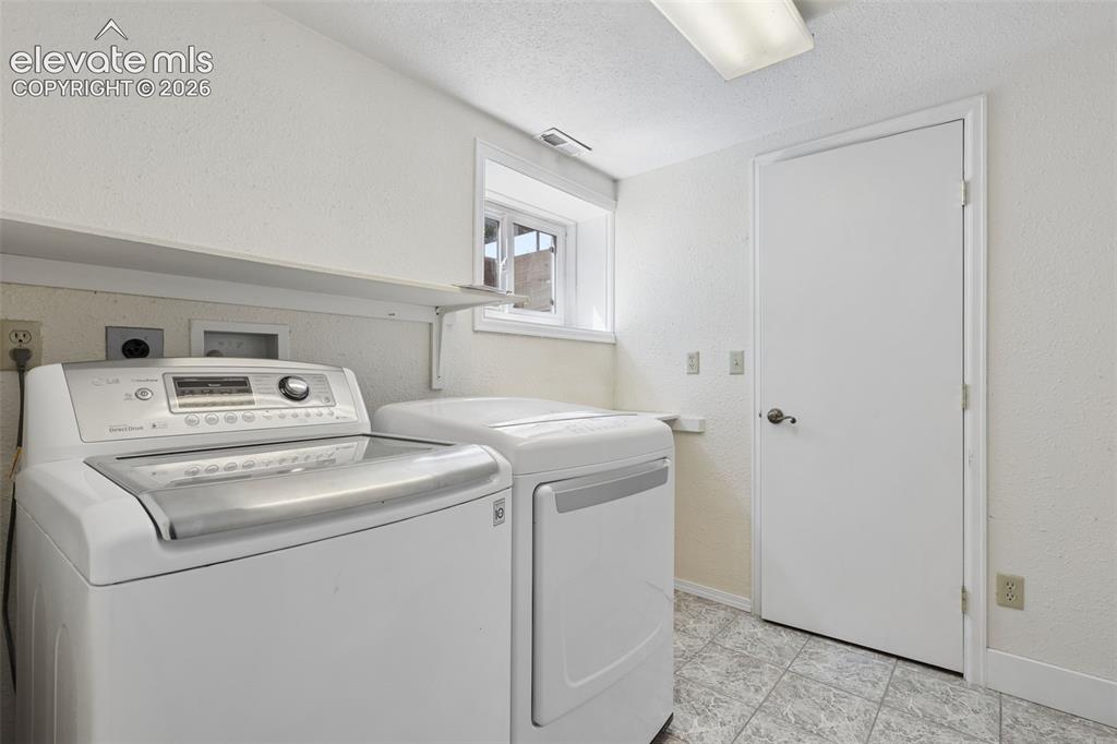 Image 29 of 44: Basement laundry room
