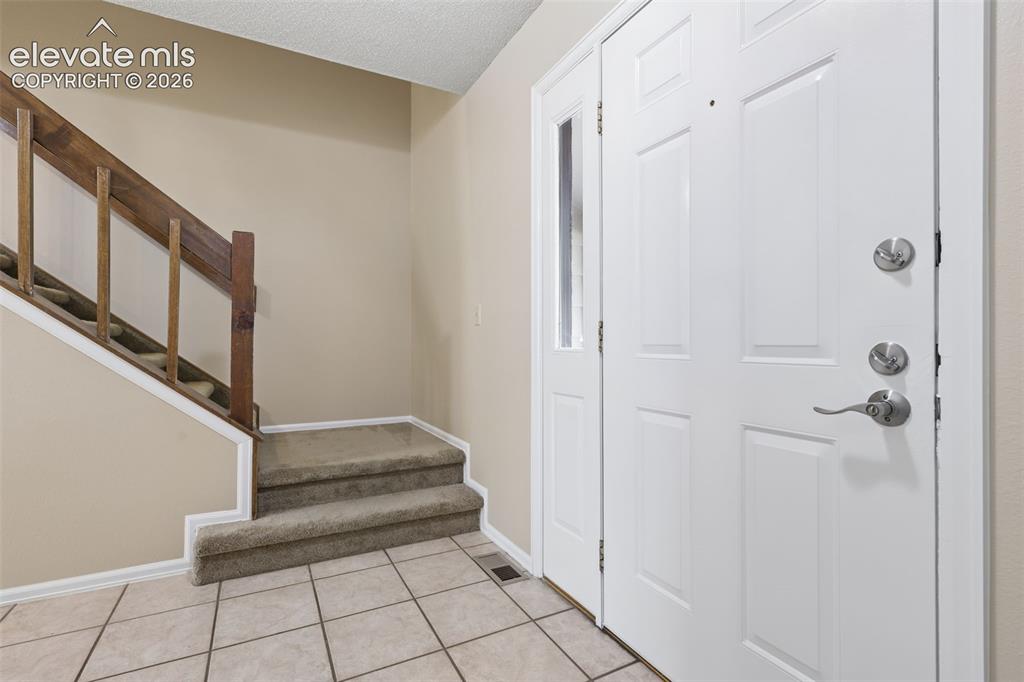 Image 8 of 44: Tiled Entry