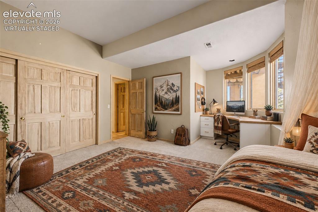 Image 41 of 50: Virtually Staged
Built-in workstation with bay windows, natural wood-finis