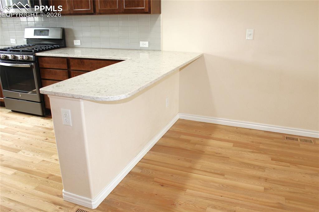 Image 16 of 46: Kitchen Nook Seating for 3 Barstools