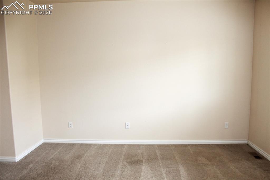 Image 18 of 46: Primary Bedroom with 3/4 Bath and Walk-in Closet