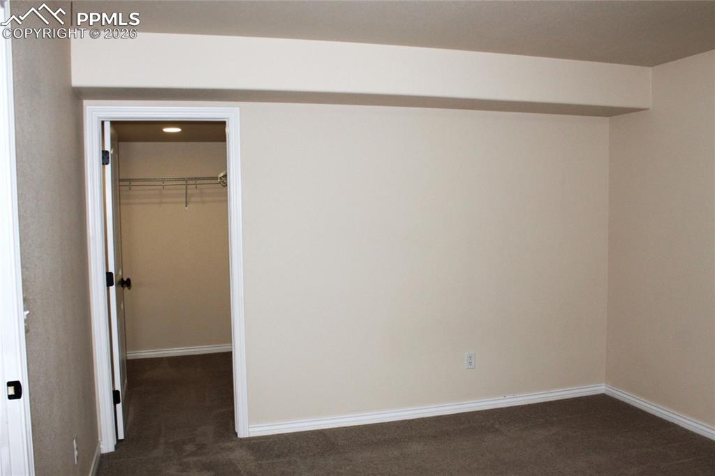 Image 42 of 46: Basement Bedroom #4 Walk-in Closet