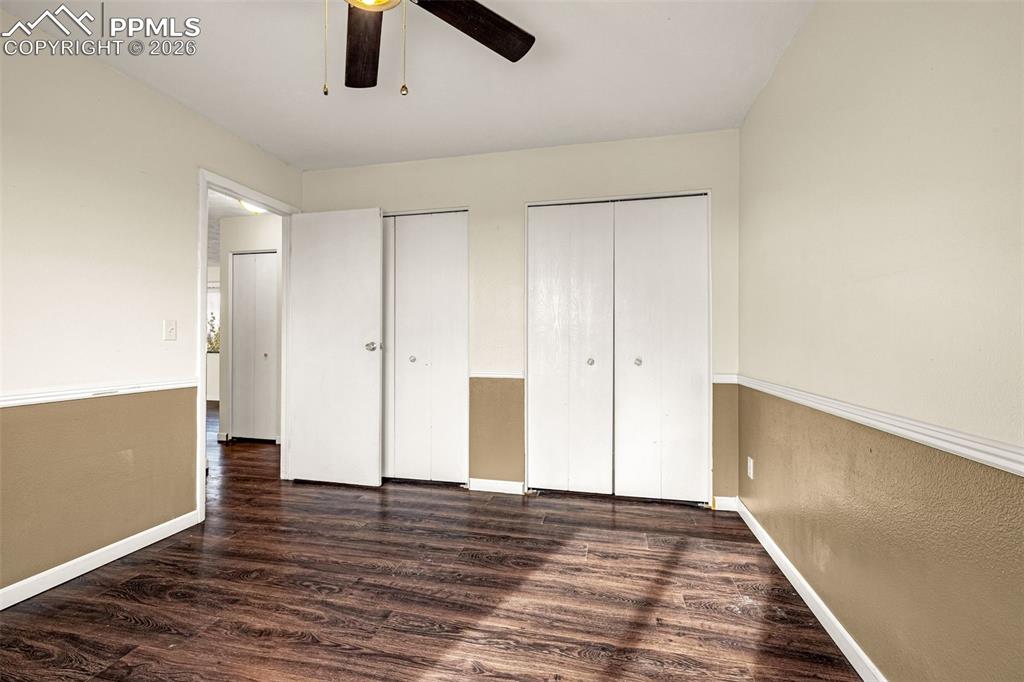 Image 16 of 21: Bedroom 2 features double closets