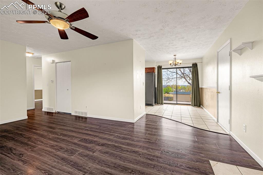 Image 8 of 21: Living room looking to dining room