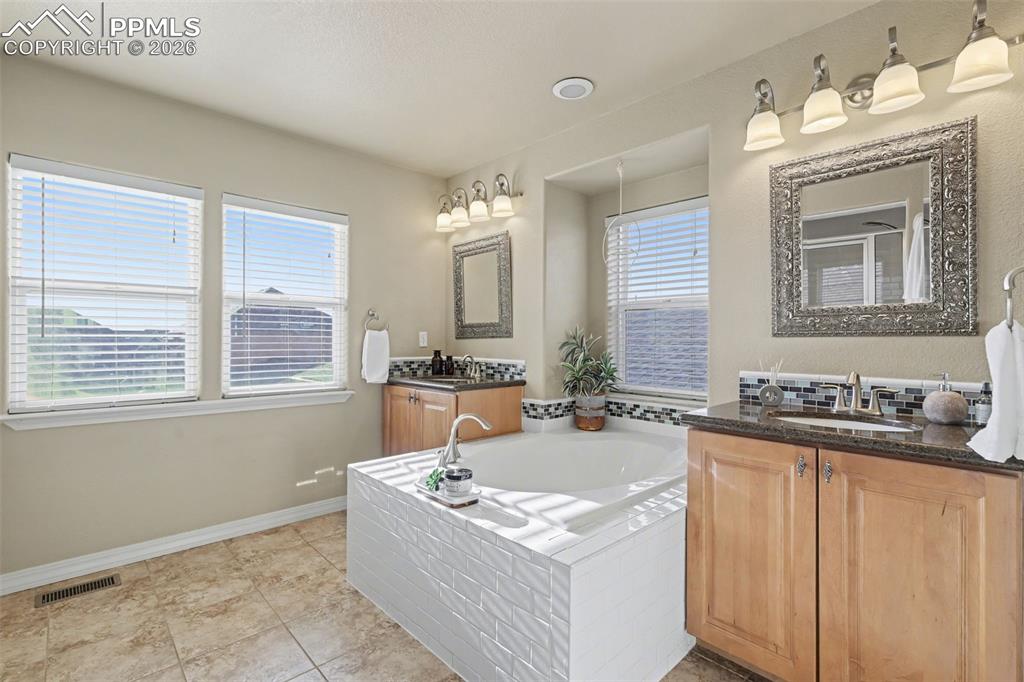 Image 24 of 49: Master Bathroom