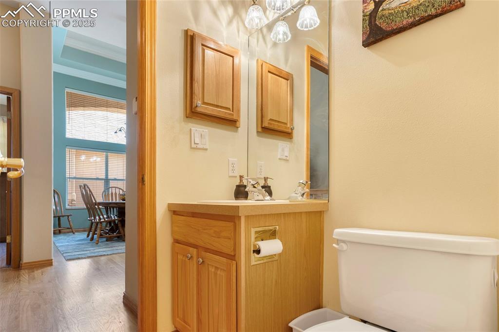 Image 13 of 33: Convenient main level powder room.
