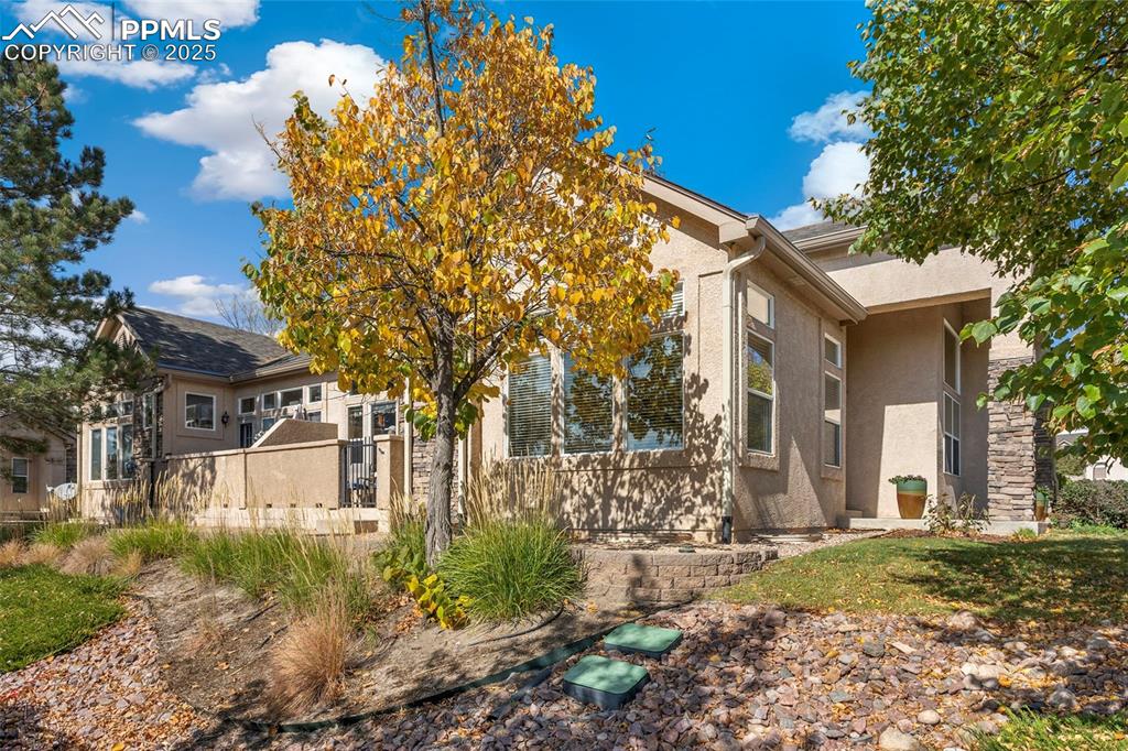 Image 2 of 33: This fabulous stucco home boasts 3 bedrooms, 3 baths, private patio and 2-c
