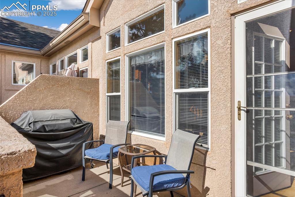 Image 29 of 33: The patio is accessed from the informal dining area.