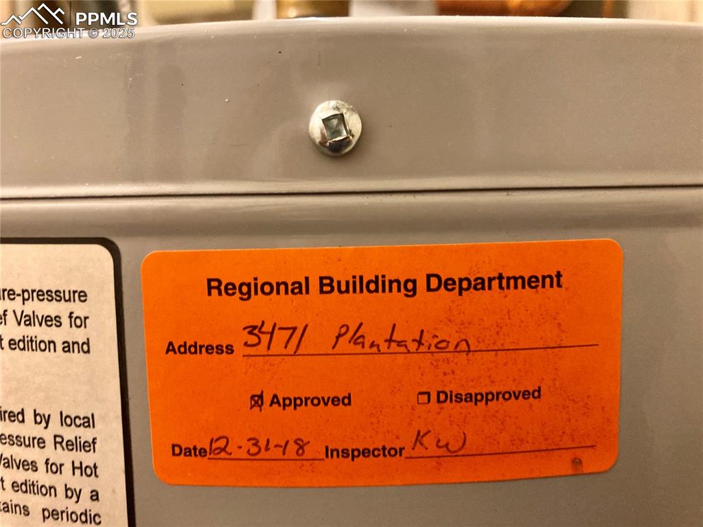 Image 33 of 33: Water heater was replaced in December 2018 with a permit.